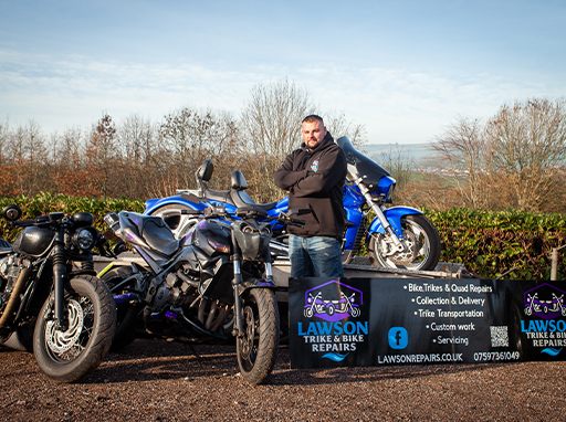 Lawson Trike and Bike Repairs with motorcycles, a trike and workshop sign
